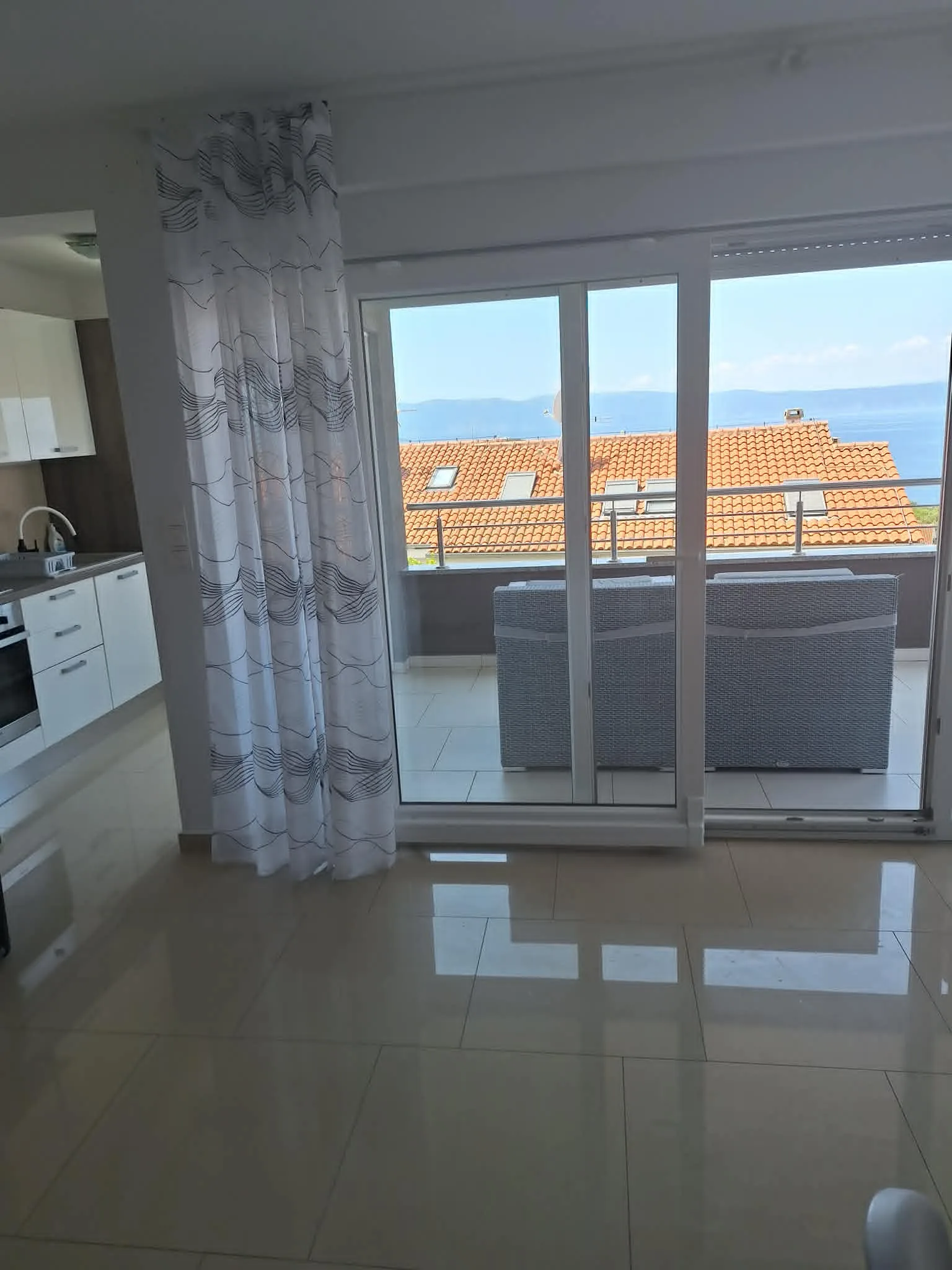 Living room opening to terrace